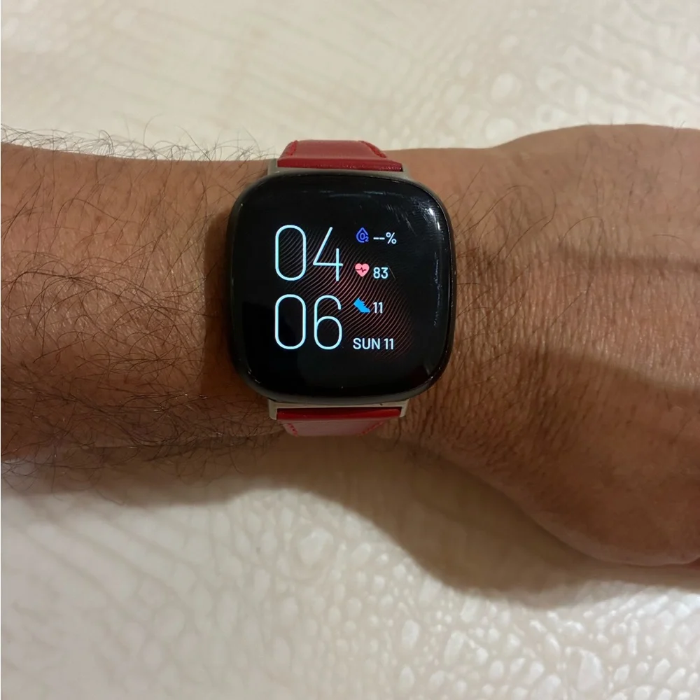 Fitbit Smartwatch with Red Strap